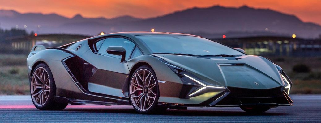 very cool lambrogini in front of sunset